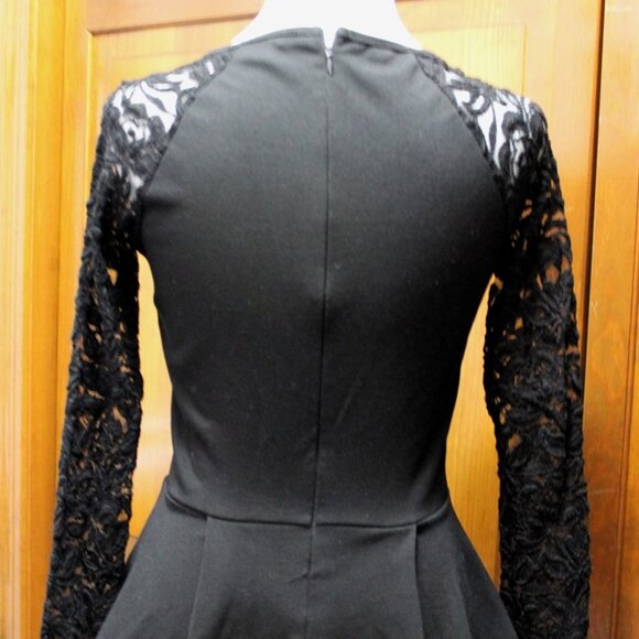 Black Peplum Top w/sheer cut-out sleeves - Picture 3 of 6